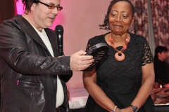 Ways Means_rabbi gives Tina plaque