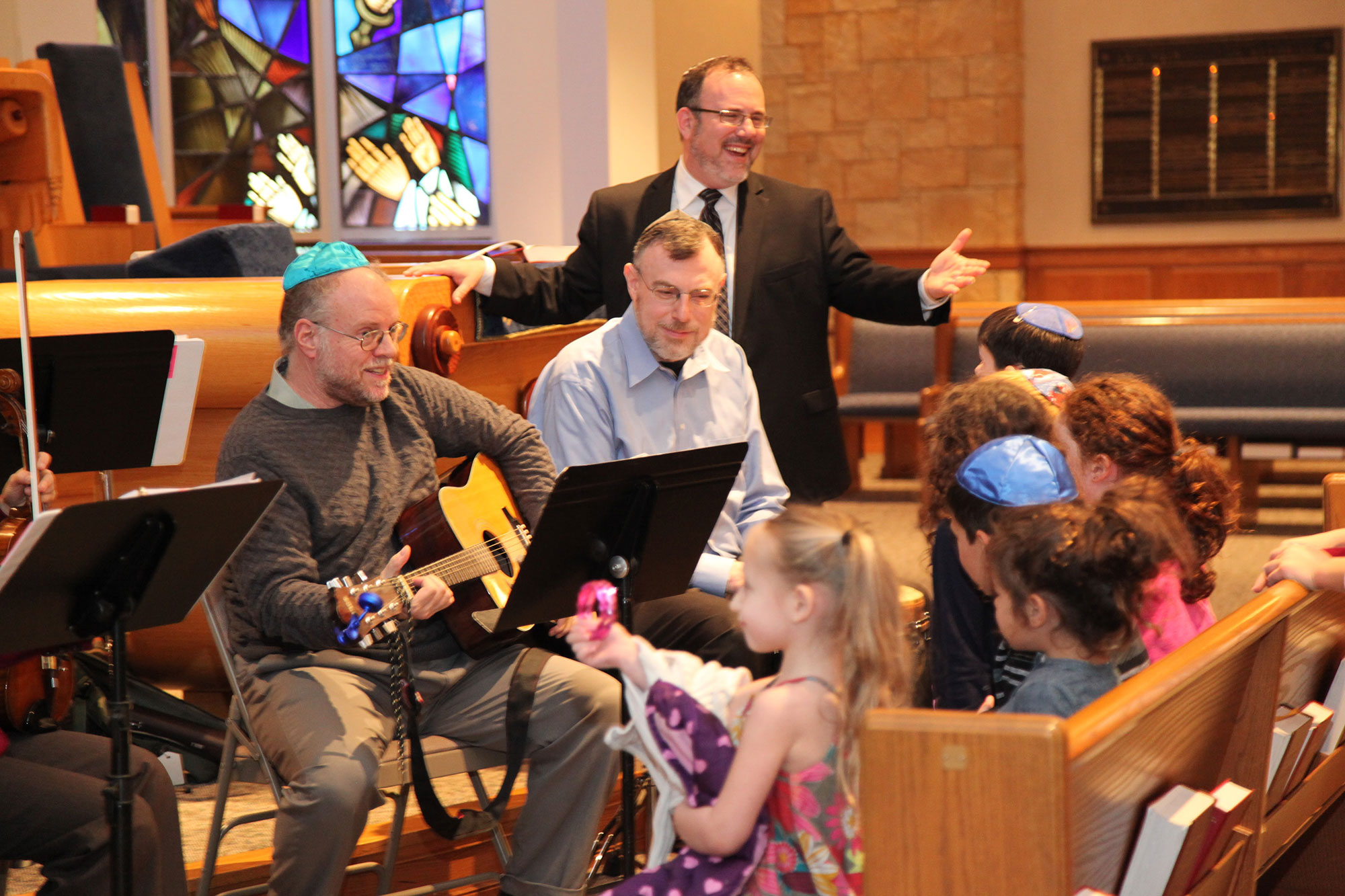 Temple Israel & JCC Rabbi and Bimah Band playing while children look on