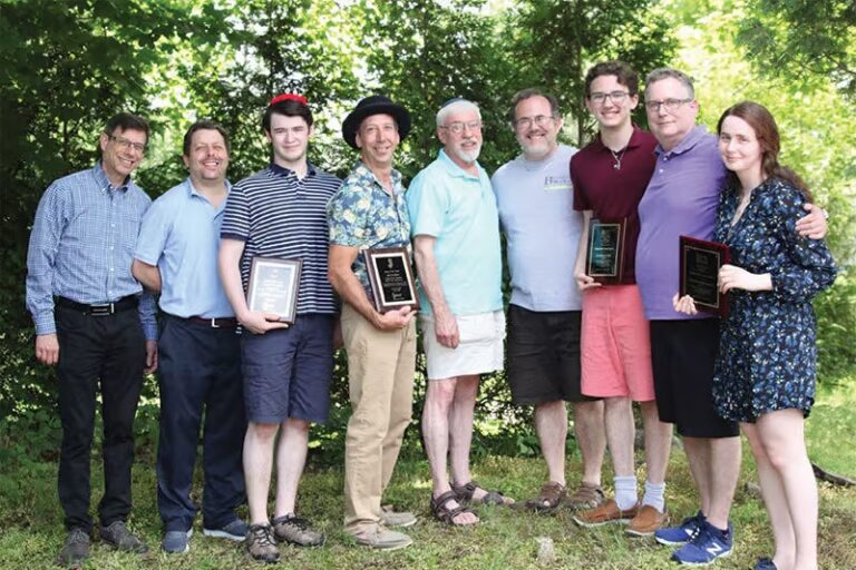 Brandeis Men's Club in Temple Israel of Northern New Jersey holding plaques