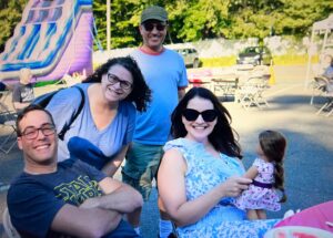 B'yachad is about families spending time as a community. This was a fun outdoor activity with bouncy inflatables, dolls, and more.